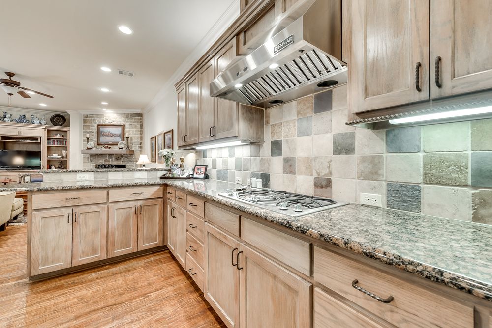    Gourmet Kitchen with Granite Countertops and Stainless Steel Appliances 