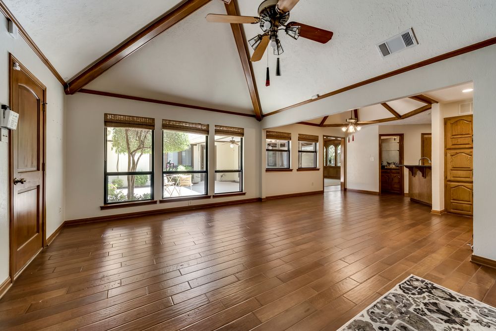   Family Room offers Wood Floors and Stunning Backyard Views 