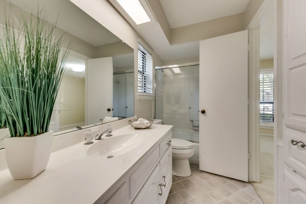    Private Bathroom Accessible by both Secondary Bedrooms 