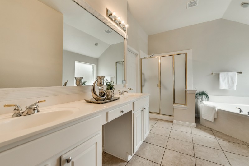   Master Bathroom with Corner Tub and Separate Shower 