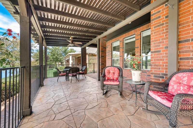    Extended Covered Stamped Concrete Patio is the Perfect Place to Relax 