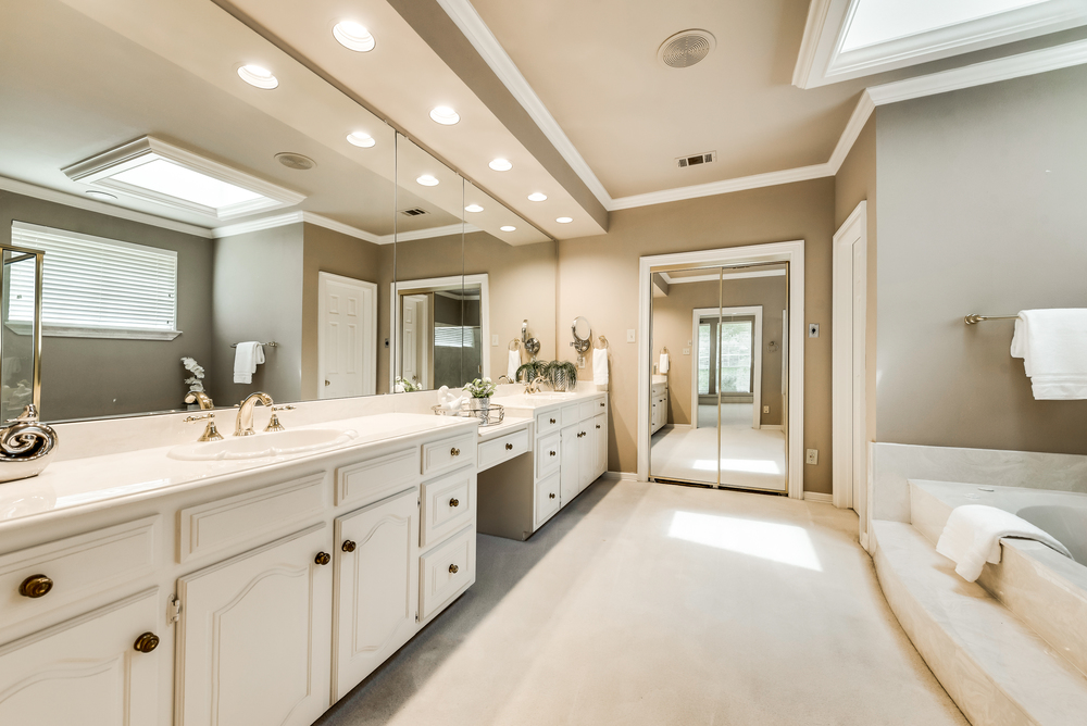    Spa Like Master Bath has Large Vanity with Dual Sinks and Walk In Closet 
