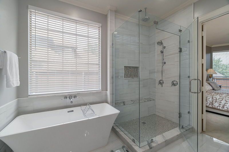    Seamless shower and Freestanding bath 