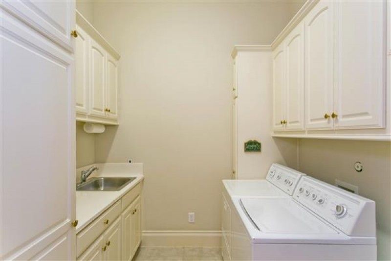    Utility Room with Sink and Room for Refrigerator 