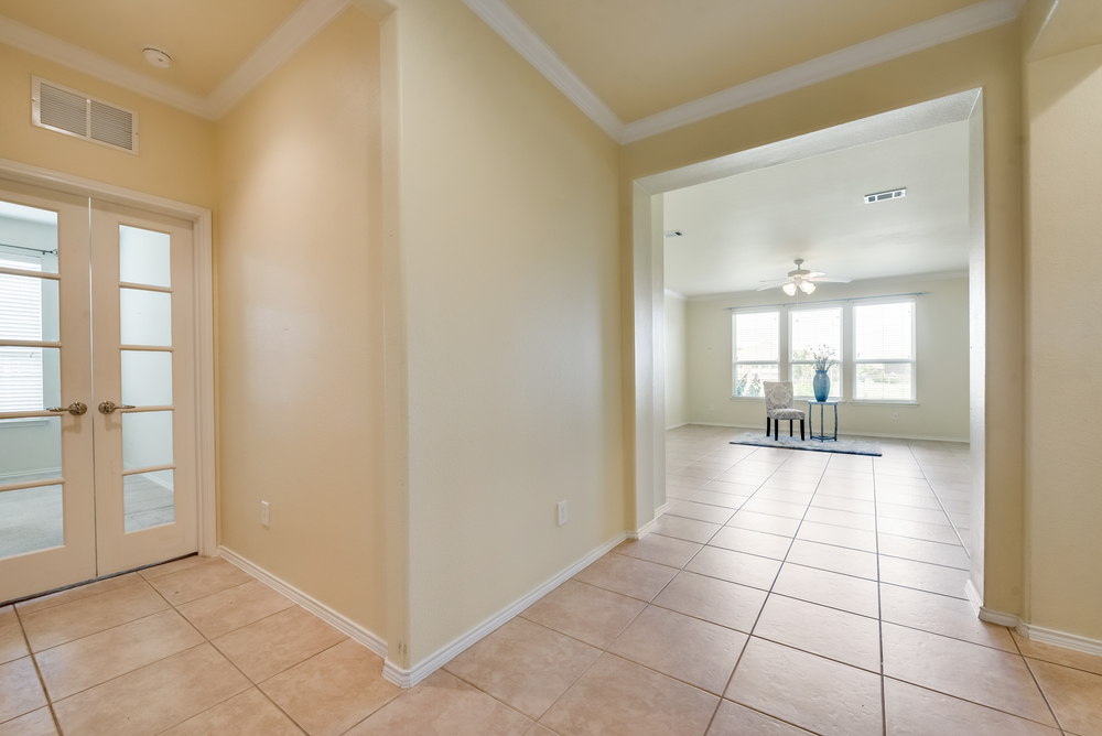    Neutral Paint and Crown Molding Throughout 
