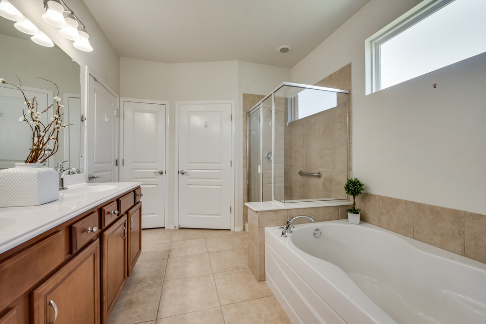    Spa Like Master Bath has Dual Sinks and Large Walk In Closet 