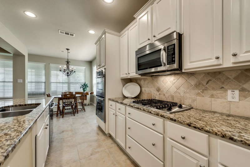    Stainless Steel Appliances and Granite Countertops 