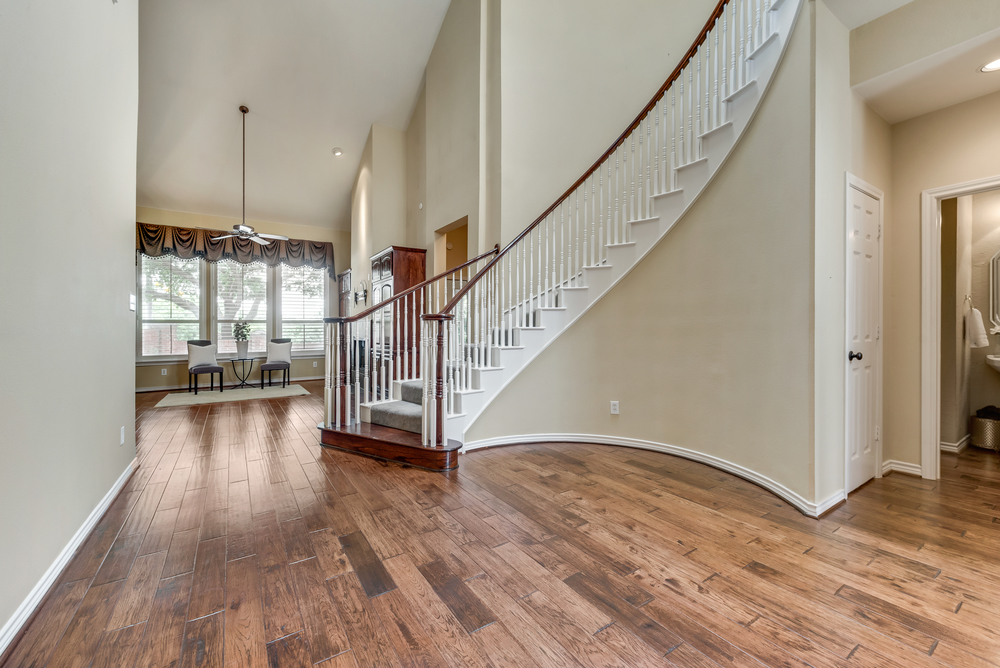    Entry with Soaring Ceiling and Beautiful Staircase 