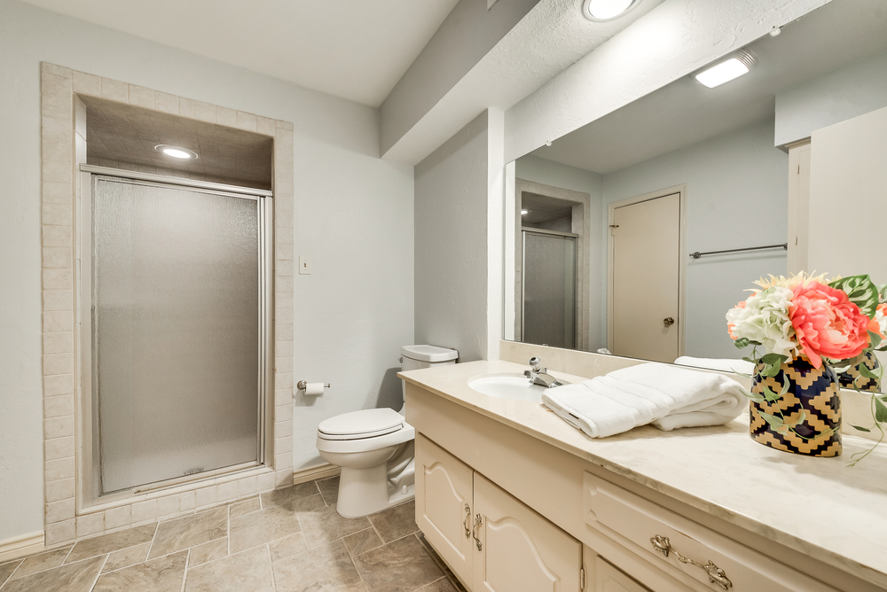    Full Bathroom with Guest Bedroom and Hall Entries 