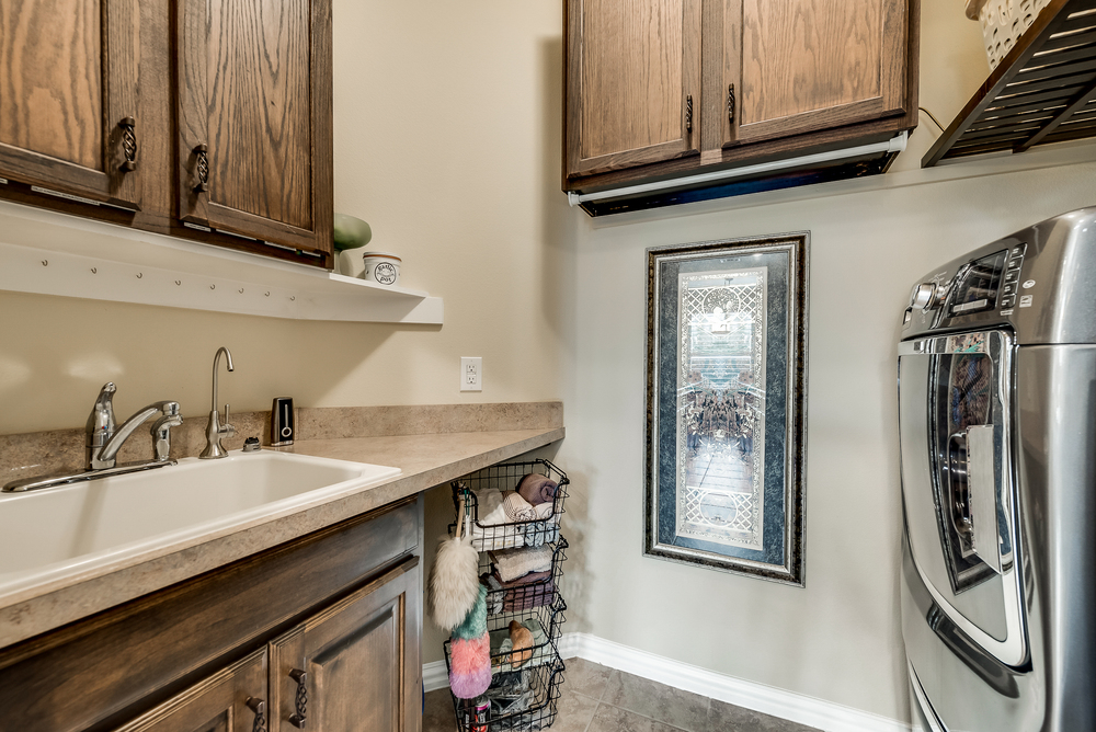    Utility Room with Sink  Cabinets and Pocket Door 