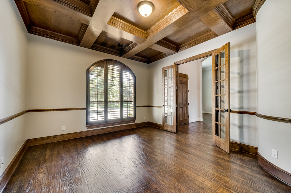   Richly Appointed Study also has Glass French Doors and Plantation Shutters 