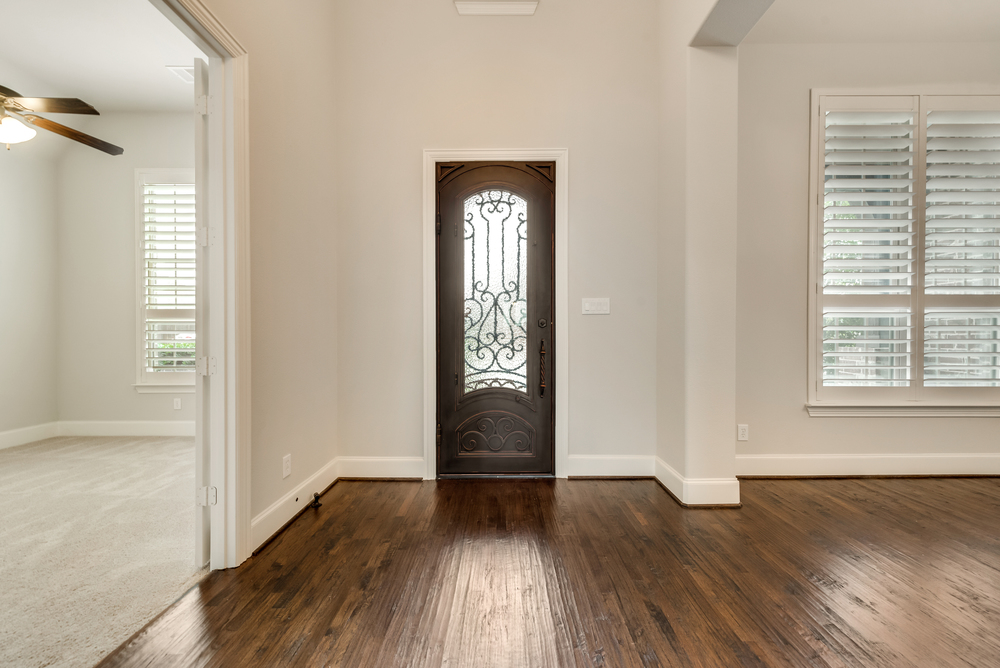    Gorgeous Iron Front Door and Spacious Entry 