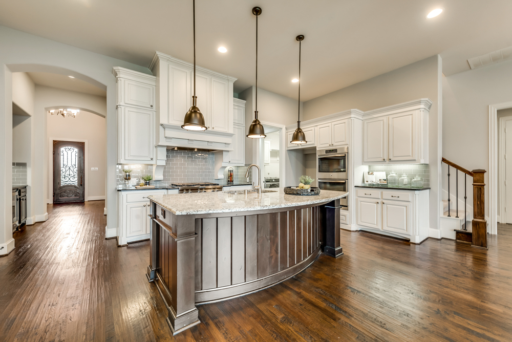    Gourmet Kitchen with Custom Cabinetry and Granite Countertops 