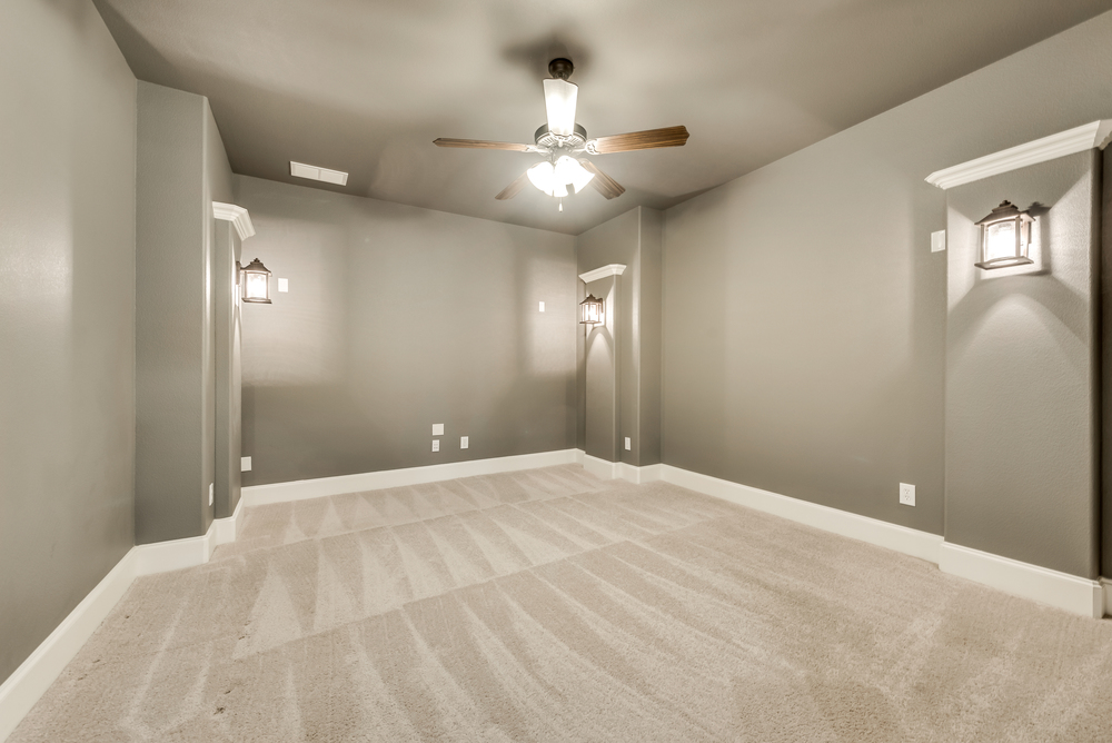    Main Level Media Room with Sconce Lighting 