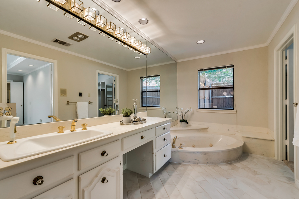    Dual Master Baths feature Separate Vanities and Jetted Tub 